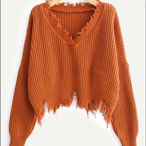 Orange fringe sweater